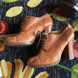 KORK-ease high heel lace shoes.